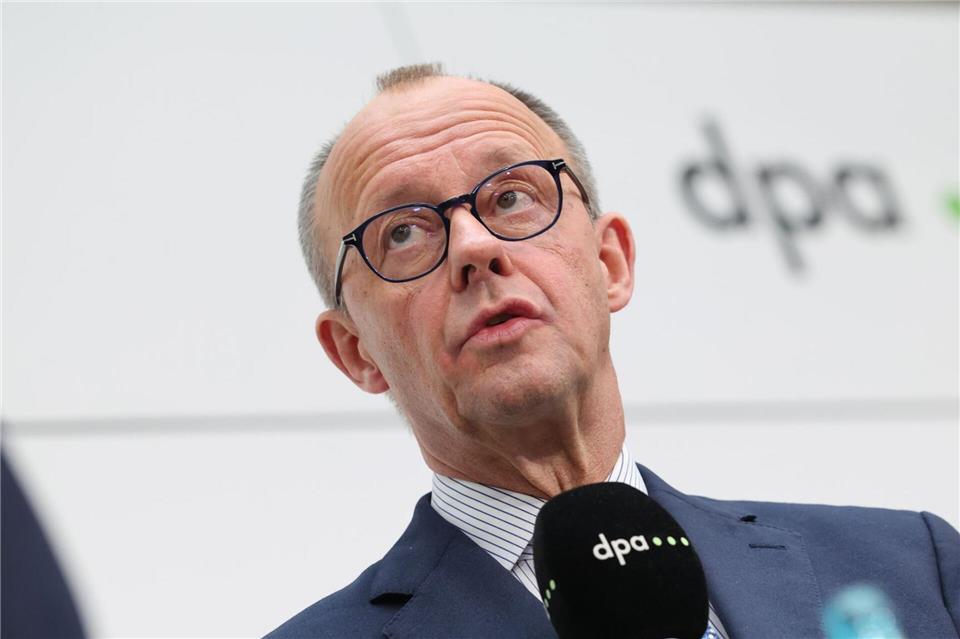 Merz will persönlich mit Trump über die Zölle sprechen. Christian Charisius/dpa