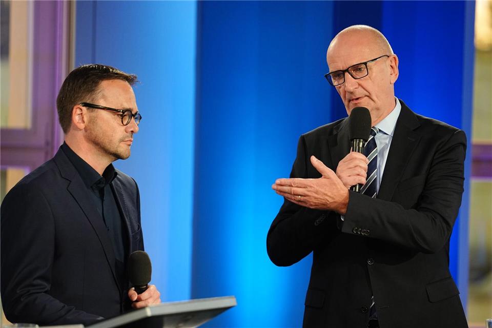 Ministerpräsident Dietmar Woidke (SPD) (rechts) und CDU-Chef Jan Redmann sind bereit für einen politischen Neustart in Brandenburg. Kay Nietfeld/dpa