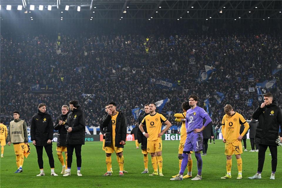 Müssen sich nach dem Aus in der Königsklasse schnell sammeln: Die Profis von Borussia Dortmund.Federico Gambarini/dpa