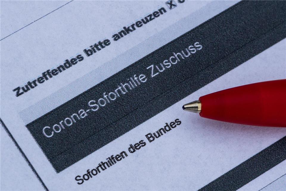 Nach der Corona-Pandemie hat der Staat hohe Rückforderungen an Empfänger von Corona-Hilfen. (Symbolbild)Robert Michael/dpa-Zentralbild/dpa