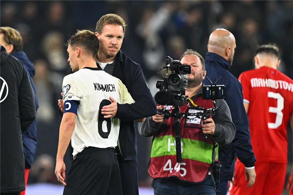 Mit Dreiklang nach Belfast: Gier, Galligkeit und gute Laune Nagelsmann und Kimmich sind nach dem Spiel gegen Luxemburg zufrieden. Tom Weller/dpa
