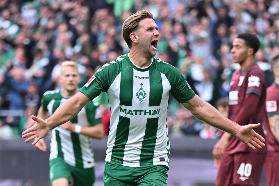 Niclas Füllkrug jubelt über sein Tor gegen Augsburg.David Inderlied/dpa