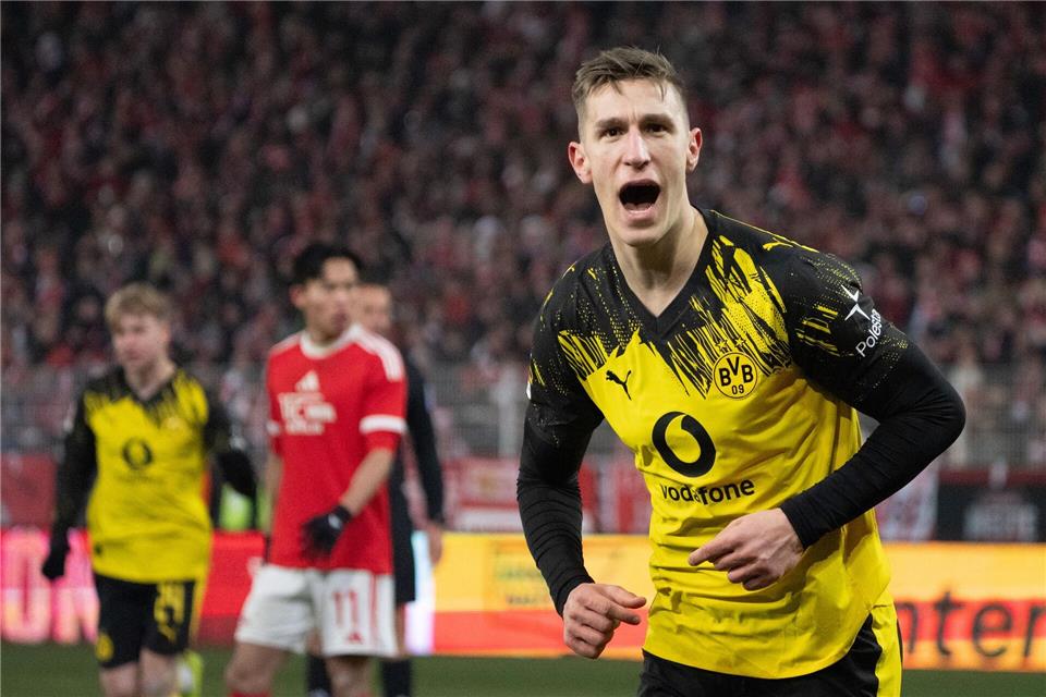 Nico Schlotterbeck bejubelt seinen Kopfballtreffer zum 2:0.Soeren Stache/dpa