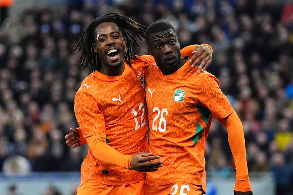 Nicolas Pepe (r) erzielte den Siegtreffer für die Elfenbeinküste.Andrew Milligan/PA Wire/dpa