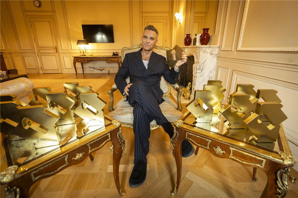 Niemand hat mehr Nummer-Eins-Plätze in den britischen Charts erreicht als Williams.Official Charts Company/PA Media/dpa