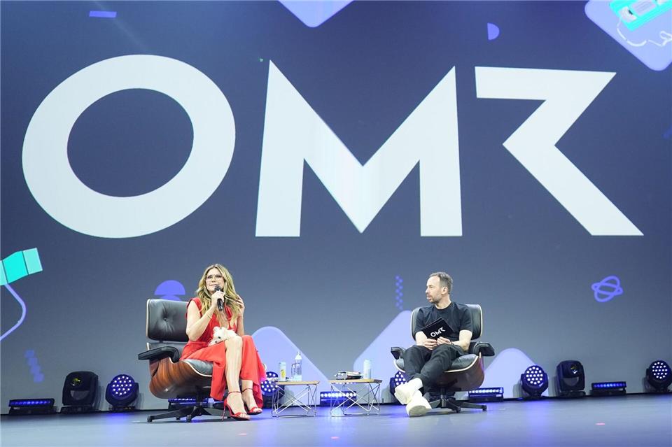 OMR-Gründer Philipp Westermeyer versucht Heidi Klum ein paar Tricks rund um ihren Erfolg zu entlocken. Marcus Brandt/dpa