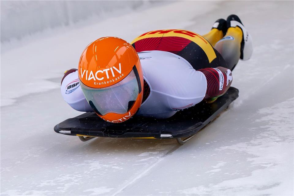 Peking-Olympiasieger Christopher Grotheer aus Deutschland kam bei der Skeleton-Premiere im Eiskanal von Cortina auf Rang 15. (Archivbild). David Inderlied/dpa