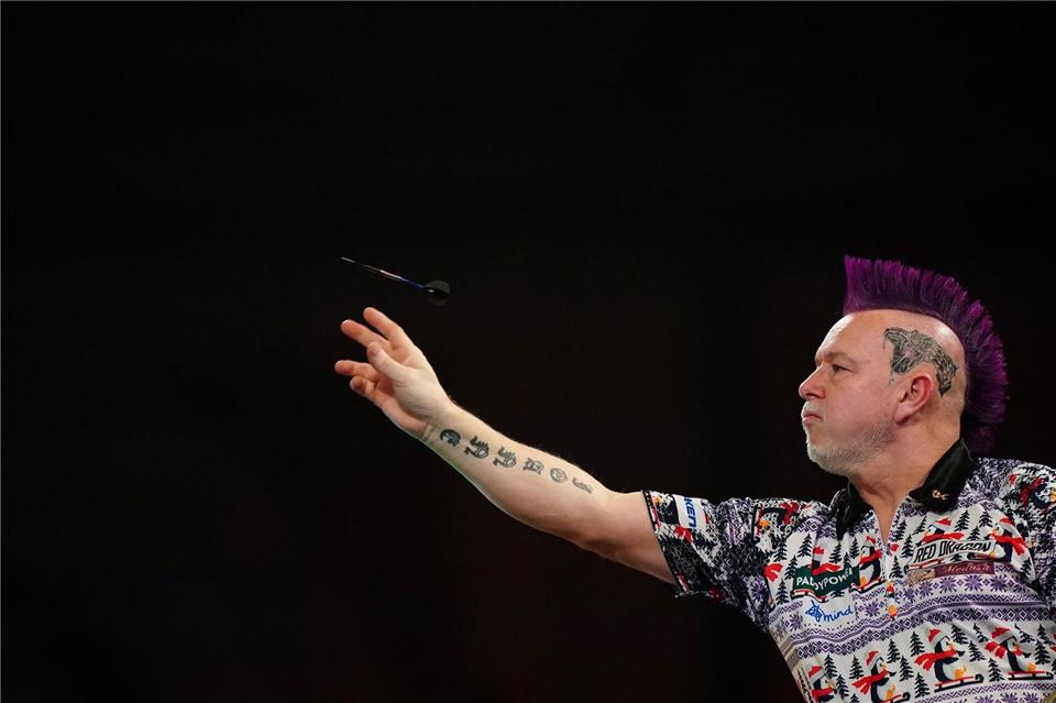 Ein Teenie und drei Weltmeister: Darts-WM in der Endphase Peter Wright schaffte gegen Weltmeister Humphries eine Überraschung.Zac Goodwin/PA Wire/dpa