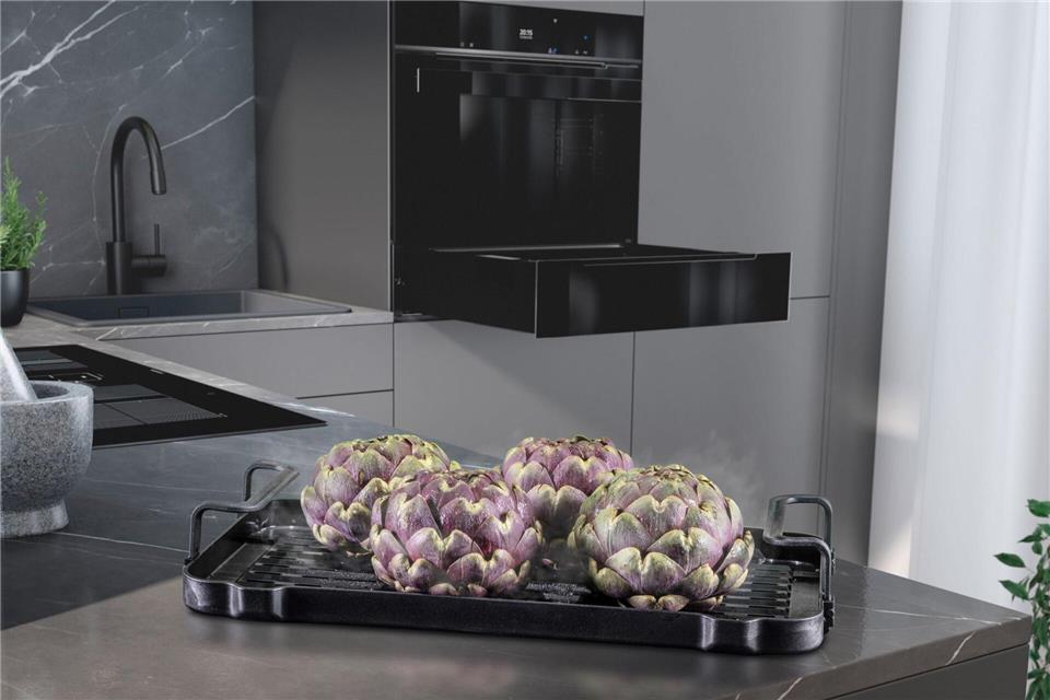 Platzsparend ist eine Dampfschublade, die sich etwa unter dem Backofen einfügen lässt.AMK/dpa-tmn