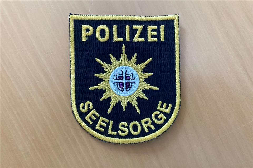 Polizeiseelsorger haben ein eigenes Emblem.Oliver Pietschmann/dpa