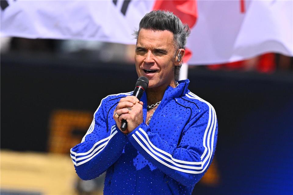 Popikone Robbie Williams zeigte sich als großer Klopp-Fan. Tom Weller/dpa