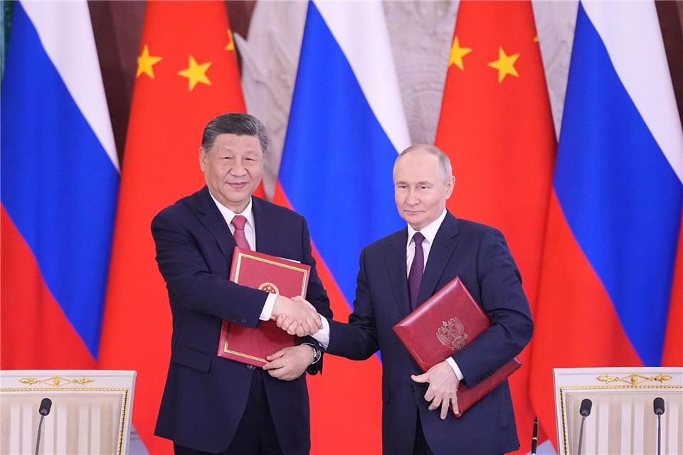 Putin und Xi bekräftigen Partnerschaft.Pavel Bednyakov/AP/dpa