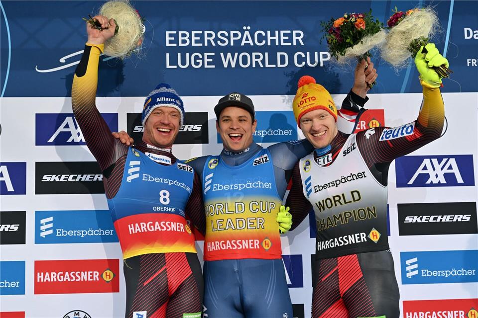 Silber und Bronze für Felix Loch (l) und Max Langenhan (r).Martin Schutt/dpa