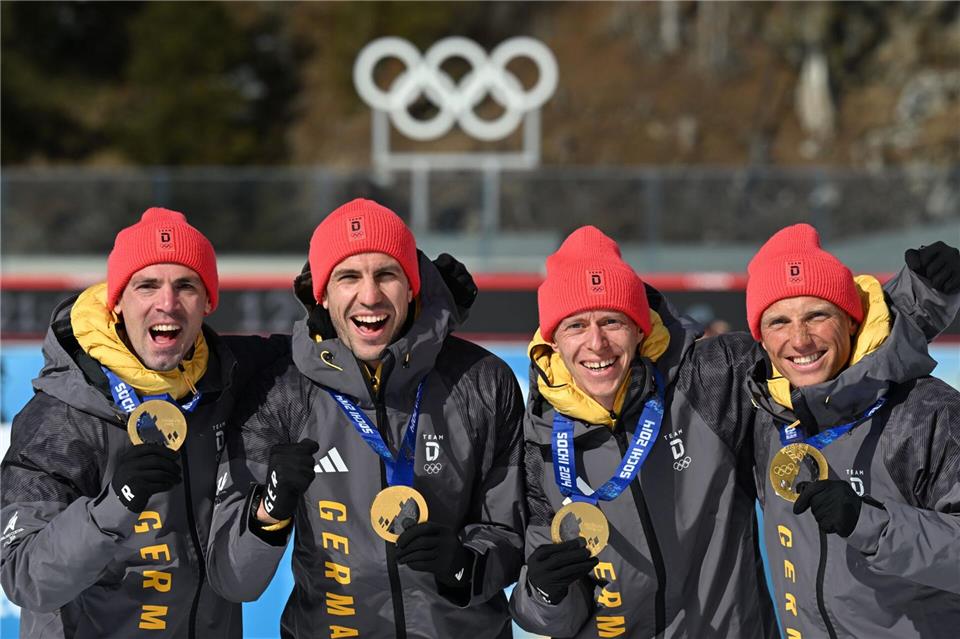 So sehen Olympiasieger aus.Hendrik Schmidt/dpa
