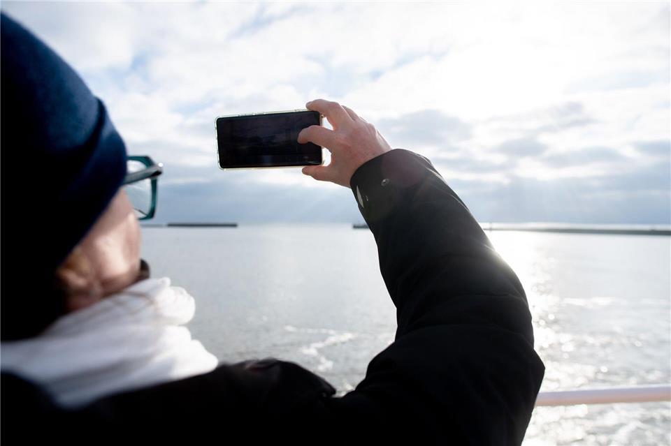 Soziale Netzwerke bieten Inspiration für neue Urlaubsziele. Hauke-Christian Dittrich/dpa