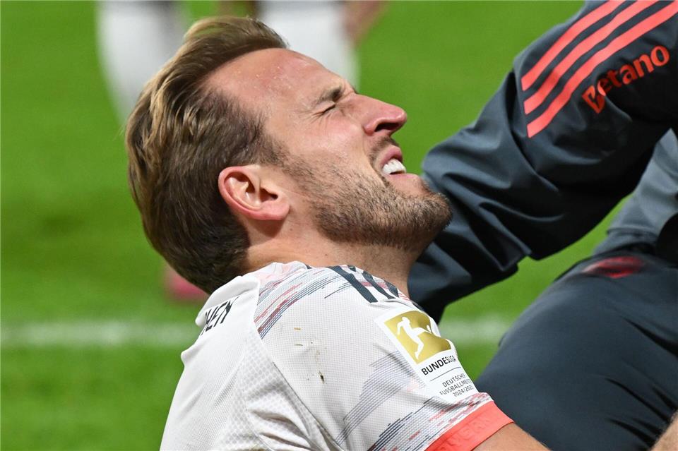 Stürmer-Star Harry Kane gab schnell Entwarnung - und sorgte für einen Bundesliga-Rekord.Arne Dedert/dpa
