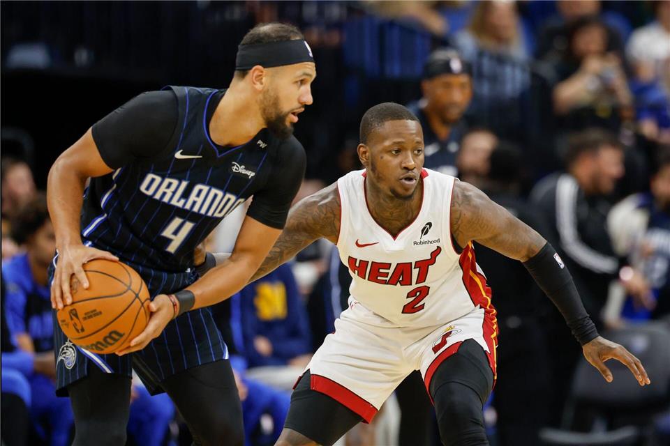 NBA-Coach Billups und Miami-Profi Rozier festgenommen Terry Rozier (r) von den Miami Heat wurde nach dem Spiel in Orlando festgenommen.Kevin Kolczynski/AP/dpa