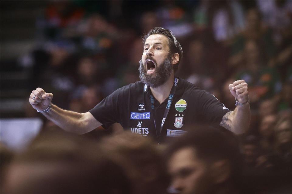 Trainer Bennet Wiegert liegt mit dem SC Magdeburg in mehreren Wettbewerben auf Titelkurs. (Archivbild)Ronny Hartmann/dpa-Zentralbild/dpa