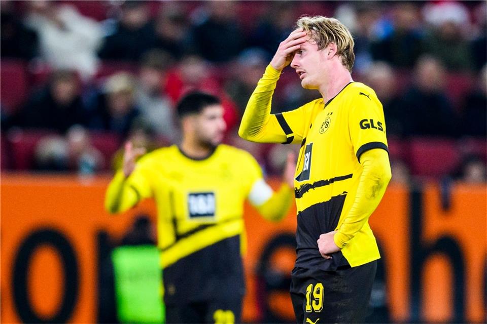 Unzufriedene Gesichter: Borussia Dortmund kam in Augsburg nur zu einem Remis.