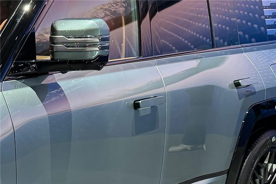 Versenkte Türgriffe können entweder durch Druck an verschiedenen Stellen ausgeklappt werden oder sie fahren sie automatisch aus.Thomas Geiger/dpa-tmn