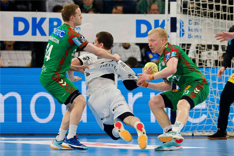 Waren beste Werfer beim Sieg des SC Magdeburg gegen GWD Minden: Omar Ingi Magnusson (l) und Magnus Saugstrup (r). (Archivbild)Frank Molter/dpa