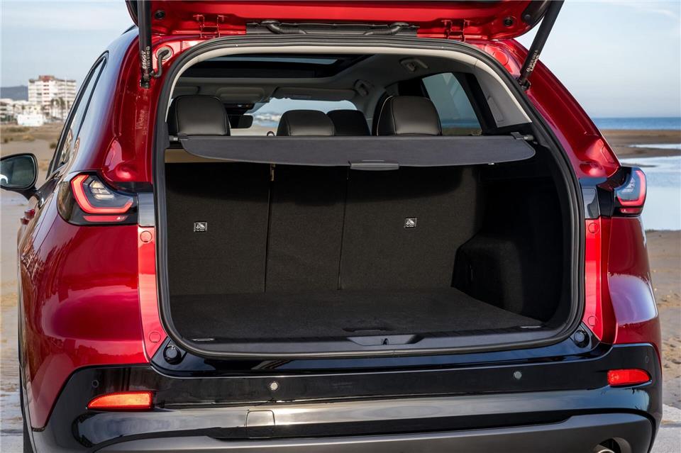 Was soll alles mit? Keine Ahnung, müssen Sie entscheiden - der Kofferraum zumindest schluckt von 583 bis 2.019 Liter. Mazda/dpa-tmn