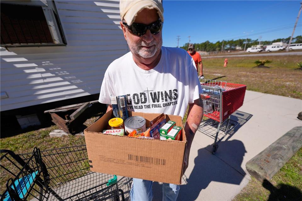 Wegen der unsicheren Lage spenden viele Amerikaner nun Lebensmittel - wie hier im Bundesstaat Missouri. (Archivbild)Lynne Sladky/AP/dpa