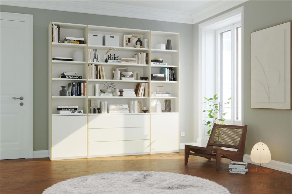 Mit Stil und Übersicht: Bücherregale geschickt einrichten Wenn Regale ganze Wände einnehmen, sollten sie ein Hingucker sein - hier ein Modell von Müller Möbelwerkstätten.Müller Möbelwerkstätten/VDM/dpa-tmn