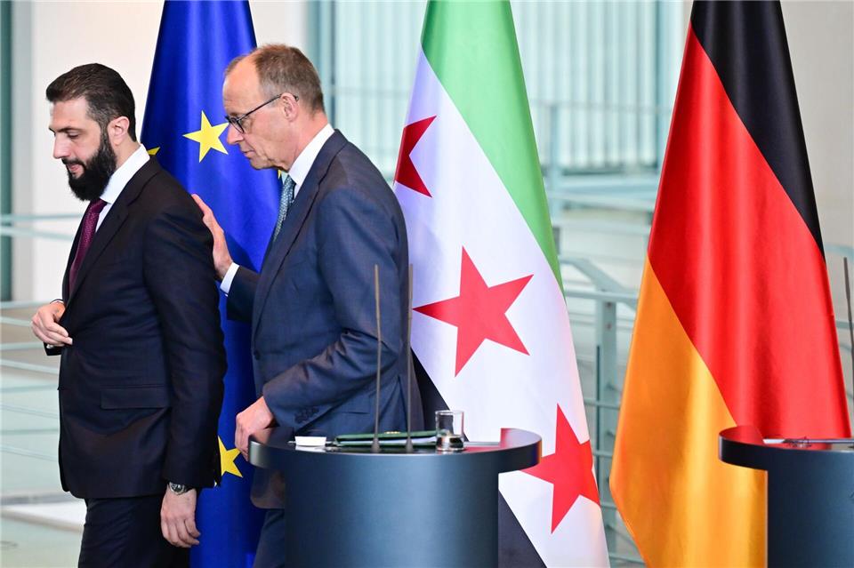 Wer hat die 80-Prozent-Zielmarke genannt, Syriens Übergangspräsident Ahmed al-Scharaa oder Kanzler Friedrich Merz (CDU)? Nicht so wichtig, meint die Bundesregierung.Sebastian Christoph Gollnow/dpa