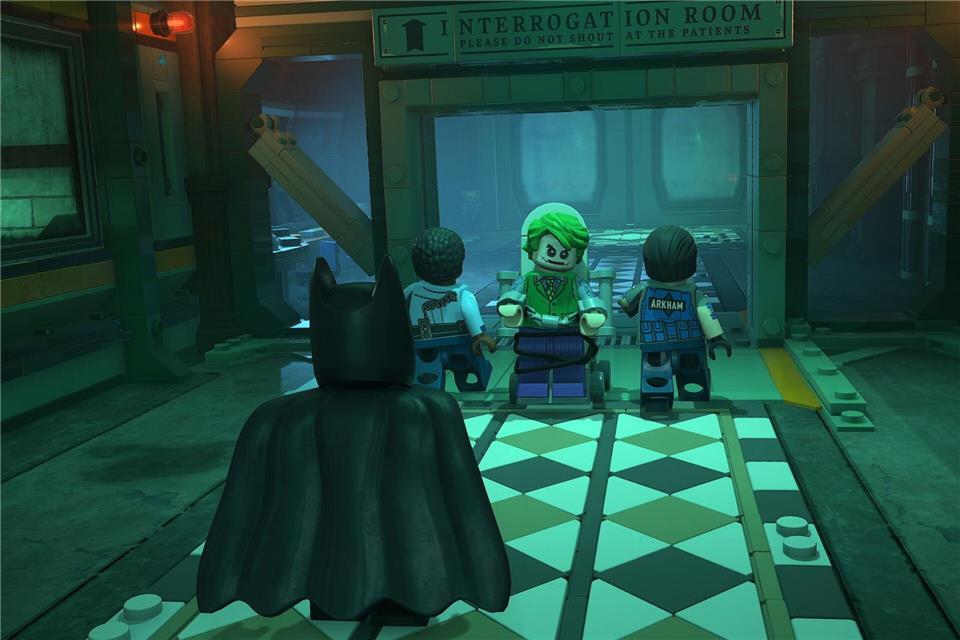Wer hier wohl zuletzt lacht? Der Joker wird ins Arkham Asylum abgeführt.-/Warner Bros. Games/dpa-tmn
