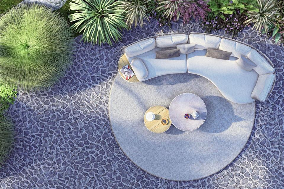 Wie aus einem Guss: Das Outdoorsofa von Zebra fügt sich mit dem Teppich und den beiden Tischen elegant als Einheit zusammen.Zebra Group/dpa-tmn