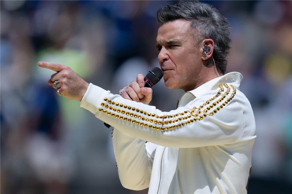 Wie beim Finale der Club-WM tritt auch Robbie Williams wieder auf. (Archivbild) Sven Hoppe/dpa