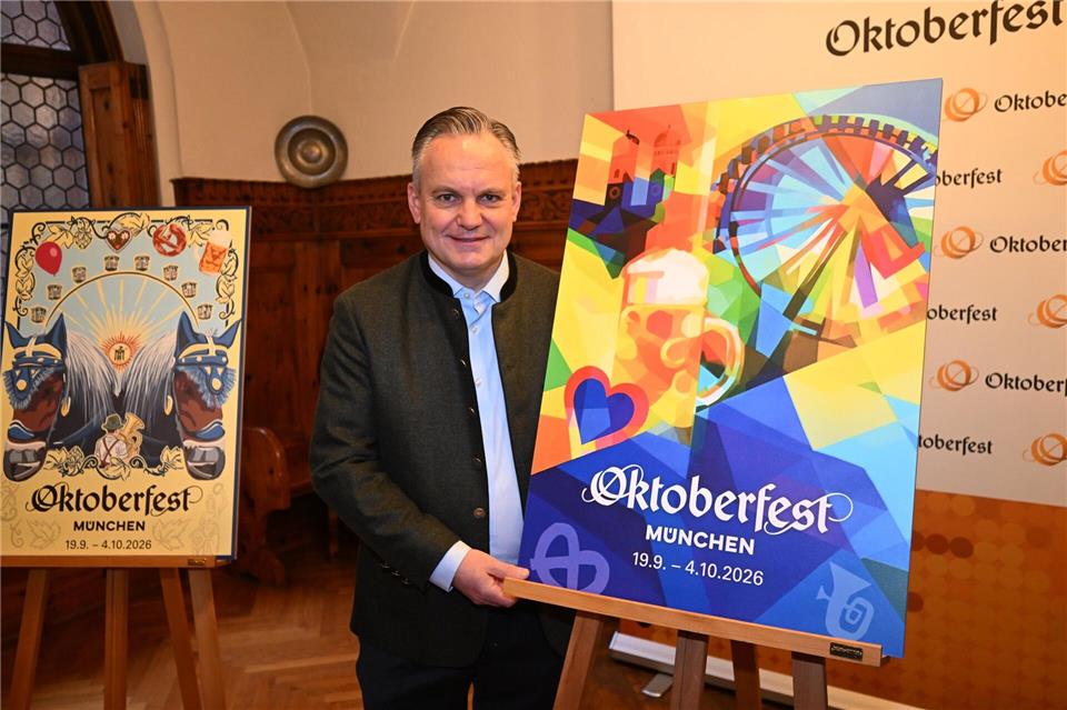 Wiesnchef Christian Scharpf präsentiert das offizielle Motiv zum Oktoberfest 2026.Felix Hörhager/dpa