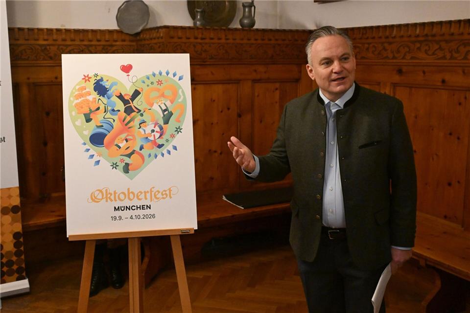 Wiesnchef Scharpf zeigt das mit dem dritten Preis ausgezeichnete Wiesn-Motiv- Felix Hörhager/dpa