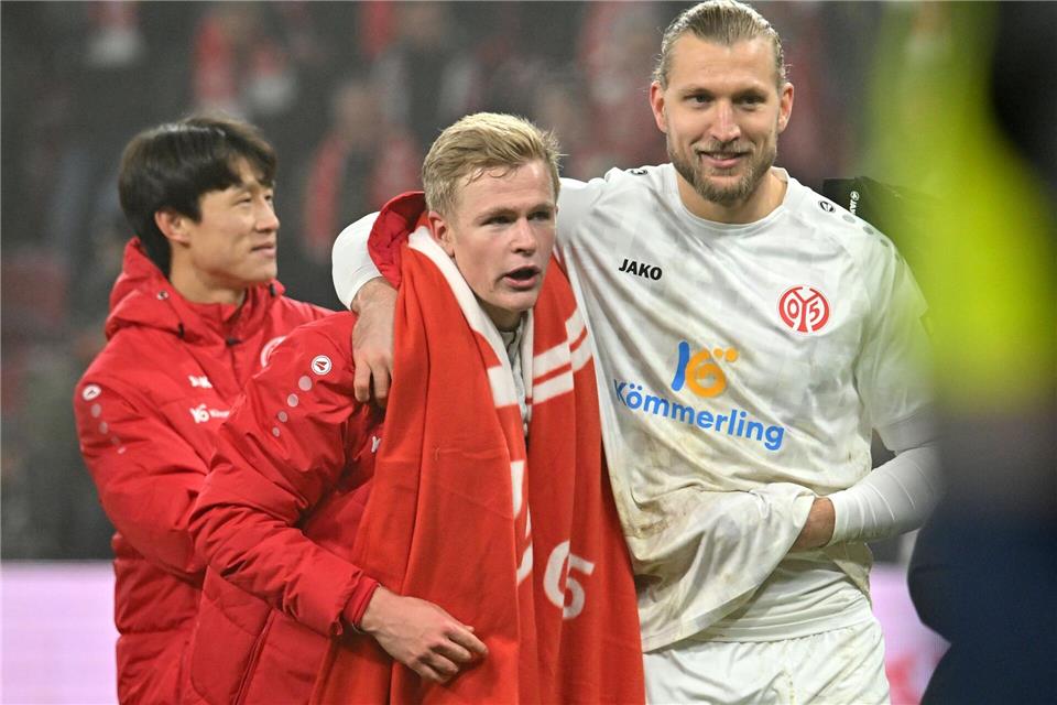 Wird den Mainzern fehlen: Jonathan Burkardt (M)Torsten Silz/dpa