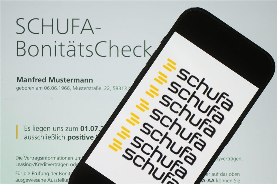 Wirtschaftsauskunfteien wie die Schufa sind private Unternehmen, die Daten sammeln, um vorherzusagen, wie wahrscheinlich es ist, dass eine Person in Zukunft ihre Rechnungen pünktlich bezahlen wird. Sebastian Kahnert/dpa