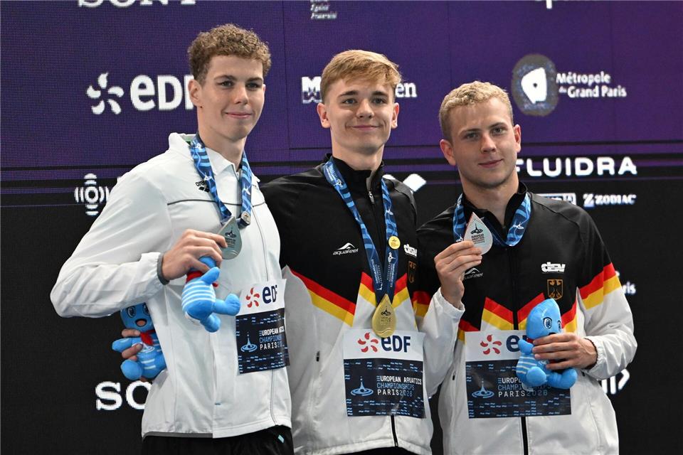 Zwei Deutsche freuen sich auf dem Podium.Emma Da Silva/AP/dpa